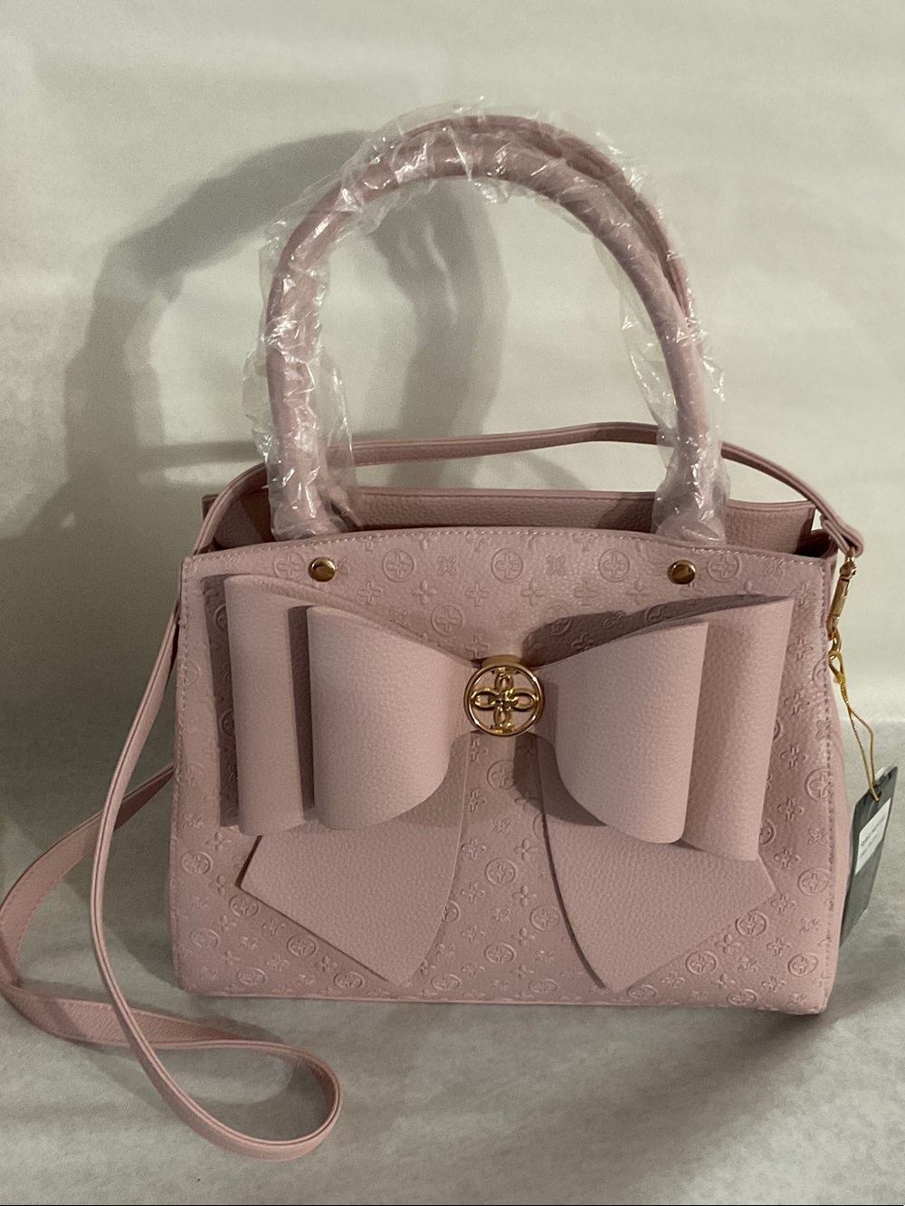 Elegant Pink Bow Satchel with Gold Accent